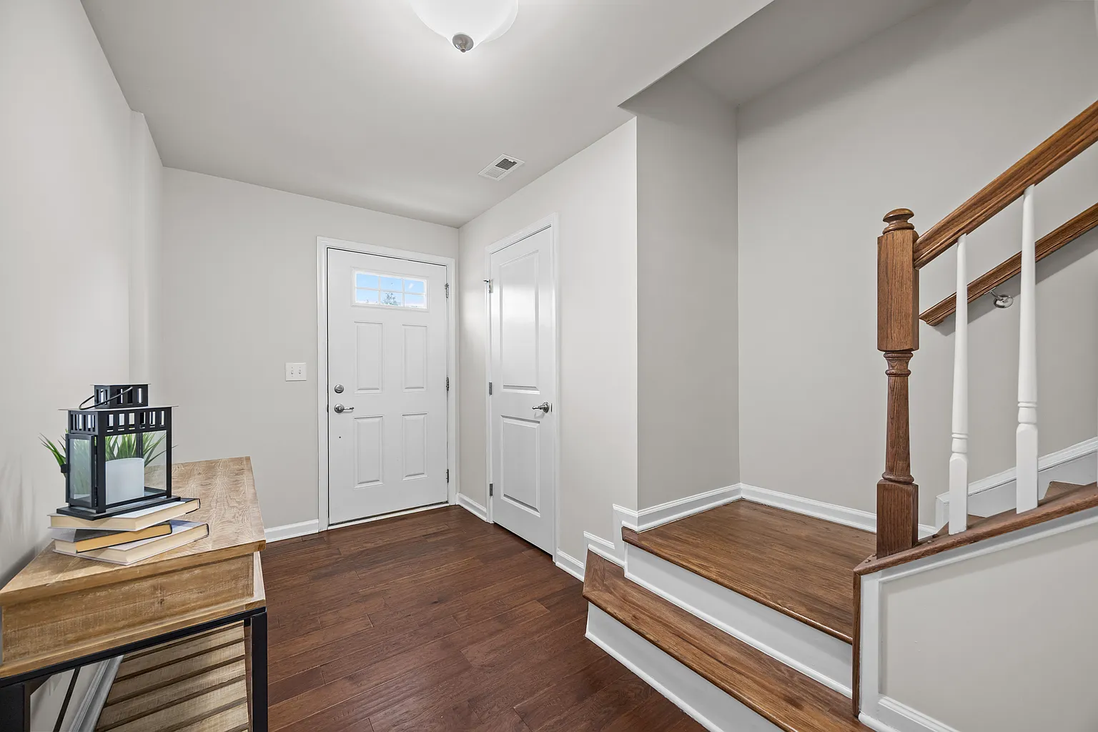 Sophisticated entryway showcasing premium finishes and natural light