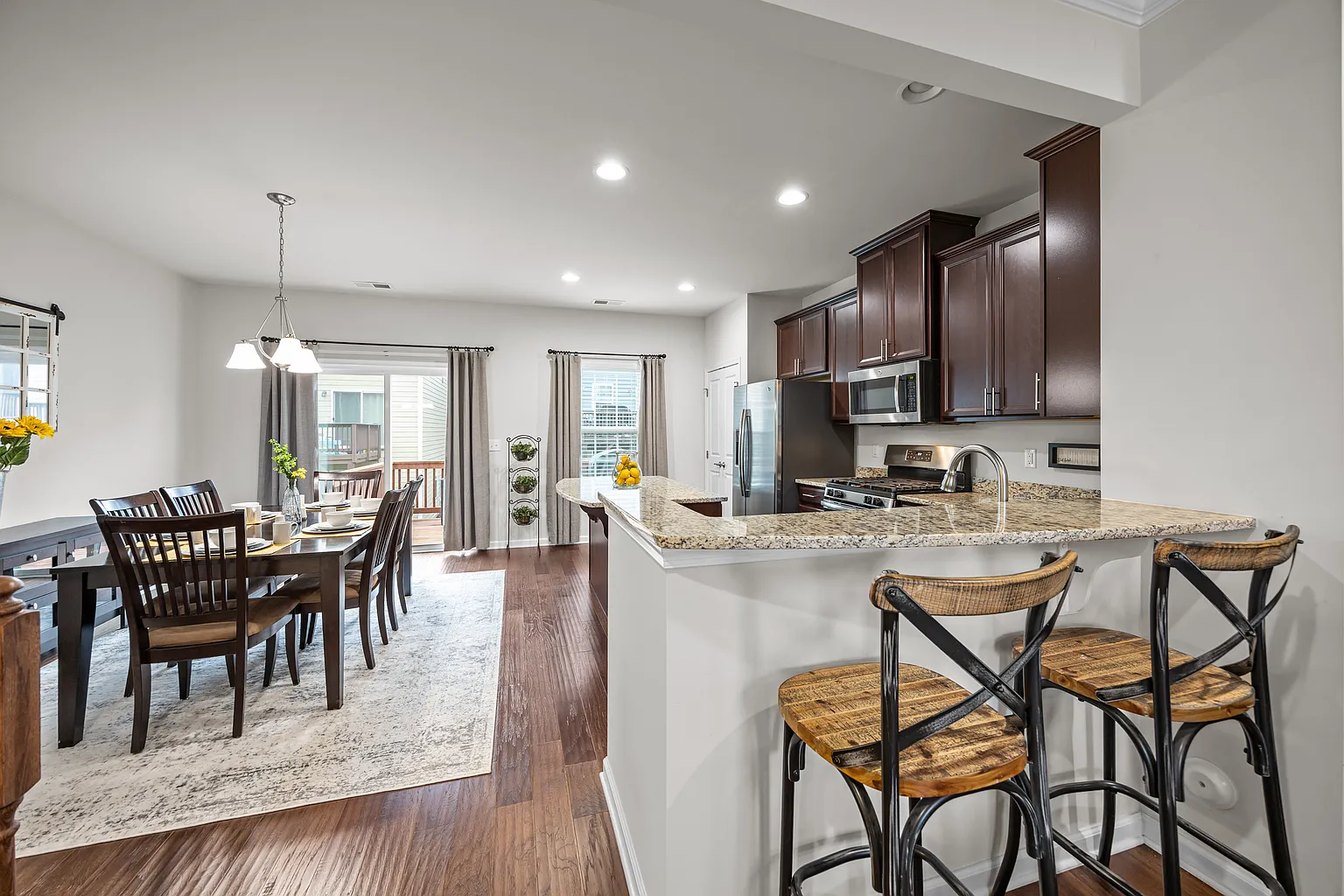 Gourmet kitchen featuring granite countertops and premium cabinetry