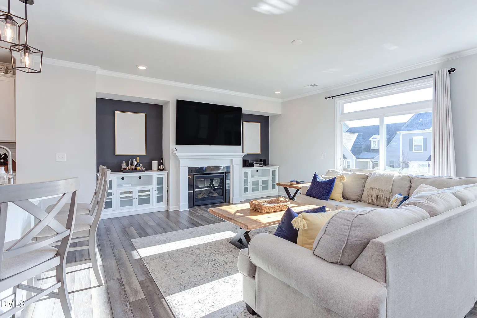 Open concept living with custom built-in entertainment center