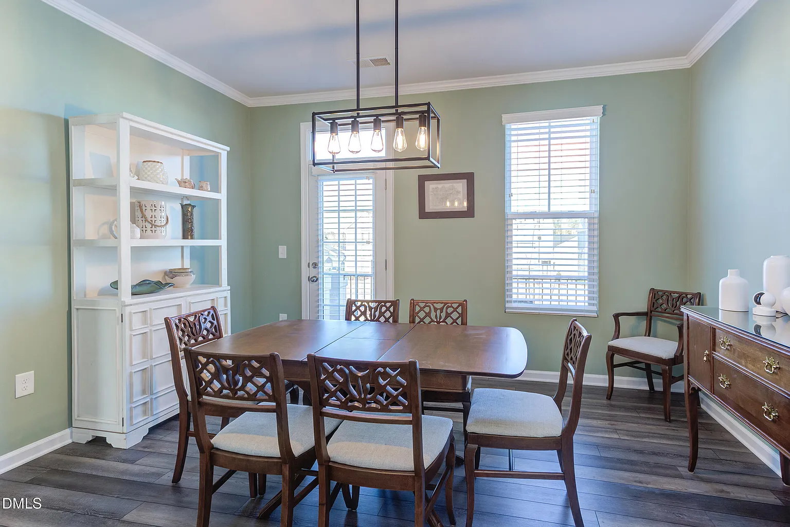 Elegant dining room with statement lighting fixture