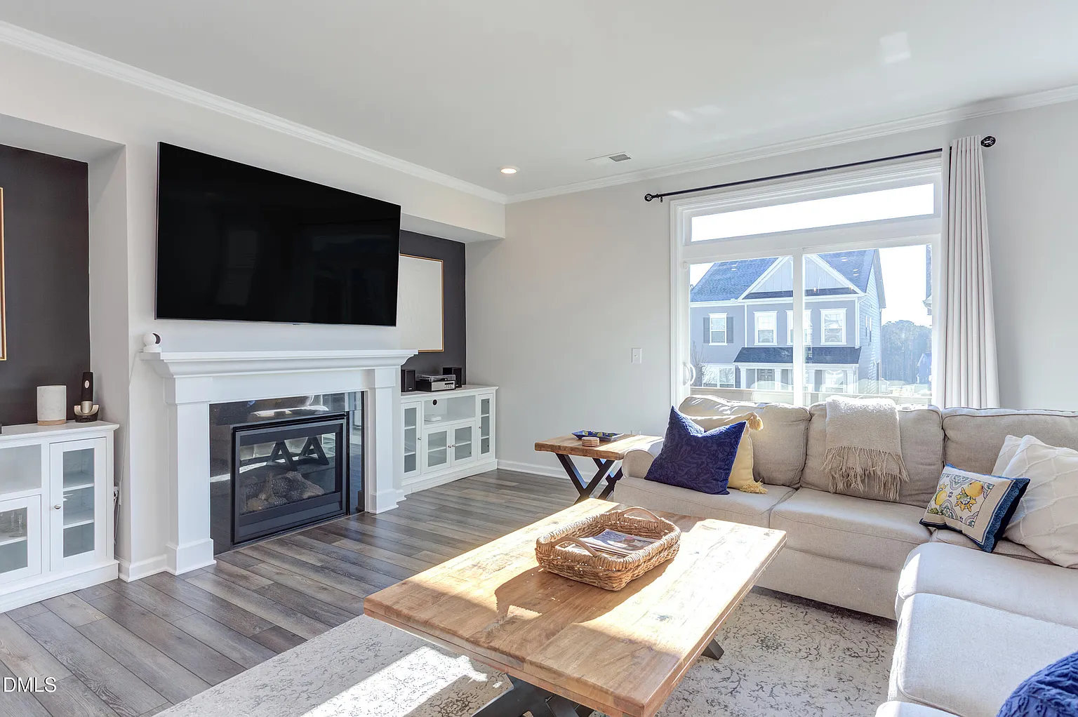 Comfortable family room with gas fireplace and built-ins